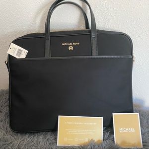 Brand new, with tags, Michael Kors laptop bag.